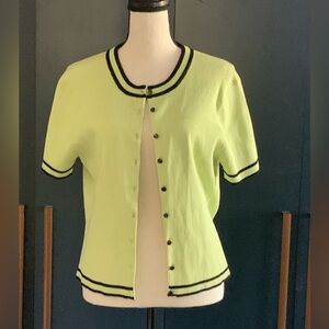 Light lime green with black trim shirt. 90’s retro style.